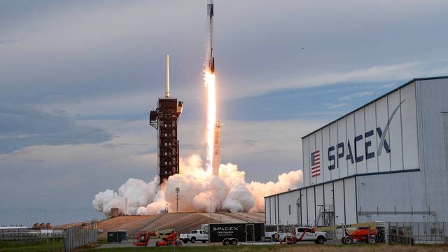 FILE PHOTO: The Axiom Mission 2 (Ax-2) aboard a SpaceX Falcon 9 and Dragon capsule, carrying 4 crew members to the International Space Station, lifts off from Kennedy Space Center