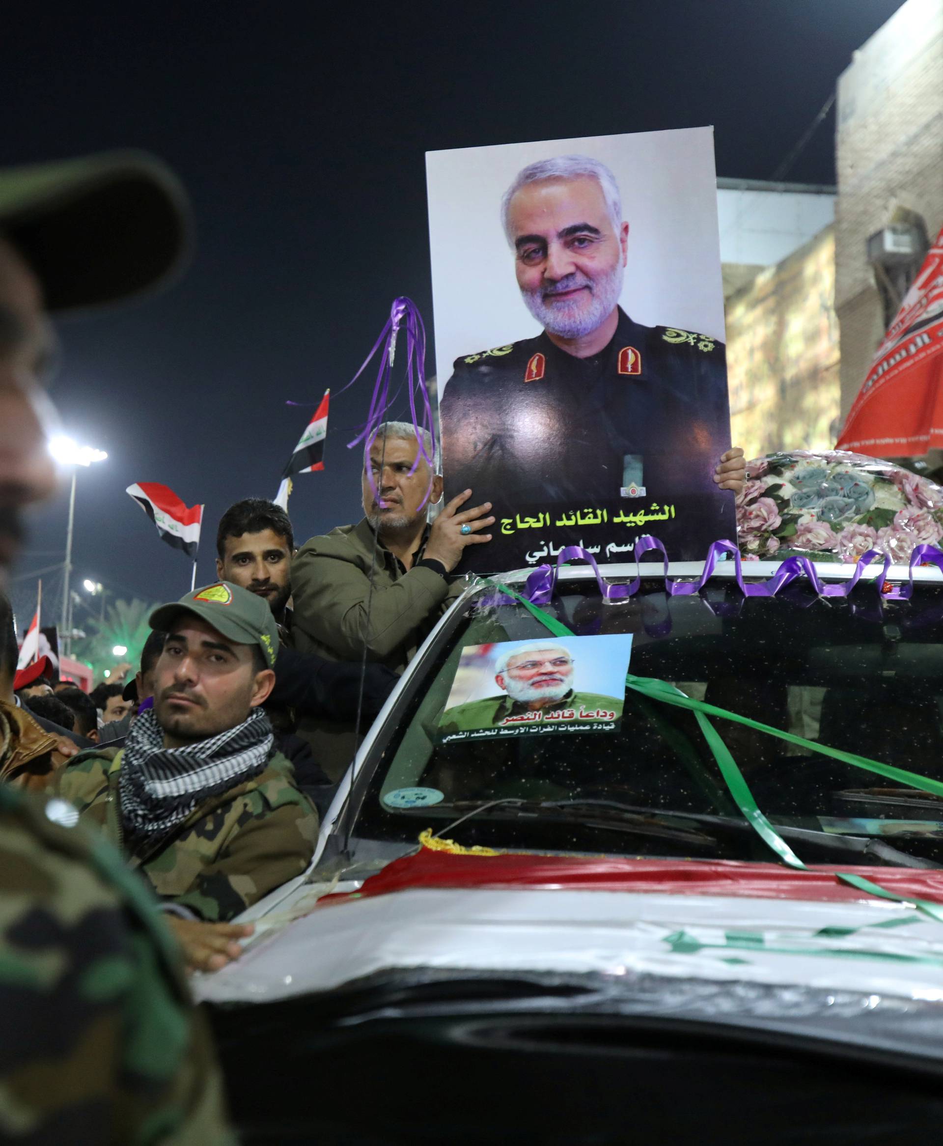 Mourners attend the funeral procession of the Iranian Major-General Qassem Soleimani and Iraqi militia commander Abu Mahdi al-Muhandis in Kerbala