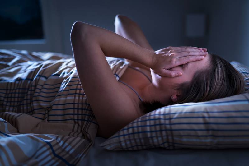 Insomnia, sleep apnea or stress concept. Sleepless woman awake a