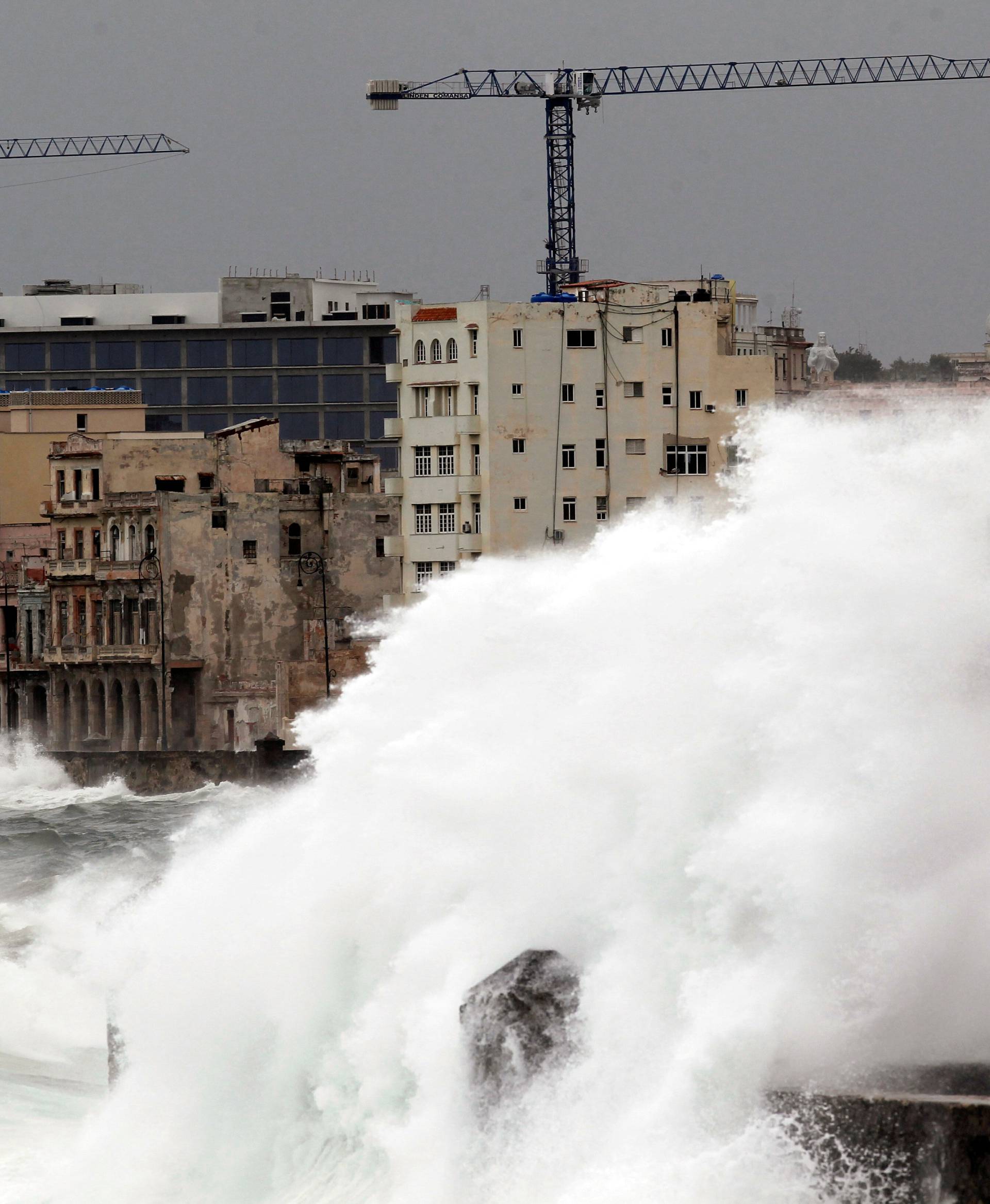 Waves crash against the seafront boulevard El Malecon ahead of the passing of Hurricane Irma, in Havana