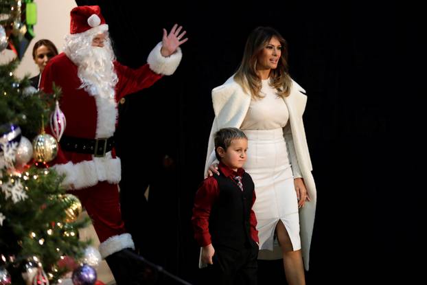First lady Melania Trump arrives to make annual Christmas visit