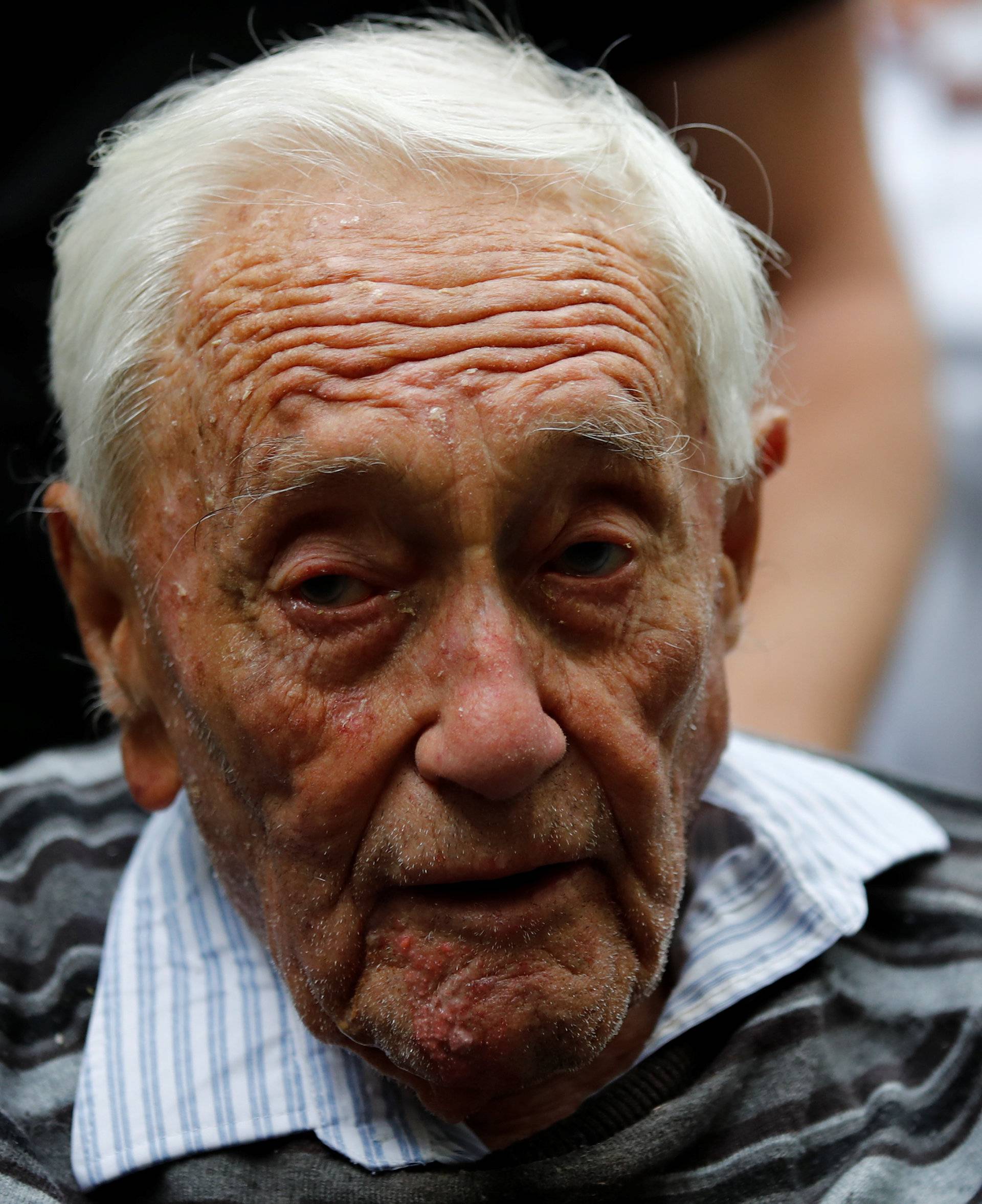 David Goodall, 104, arrives to hold a news conference a day before he intends to take his own life in assisted suicide, in Basel