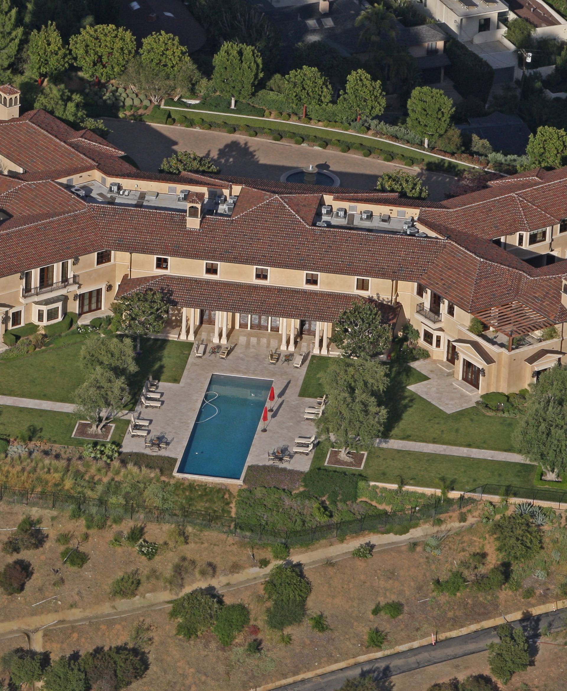 Prince Harry and Meghan Markle have reportedly been staying in an ultra-luxury Beverly Hills mansion that belongs to Tyler Perry, . Perry's eight-bedroom, 12-bathroom Tuscan-style villa sits on the top of a hill in the exclusive Beverly Ridge Estates gate