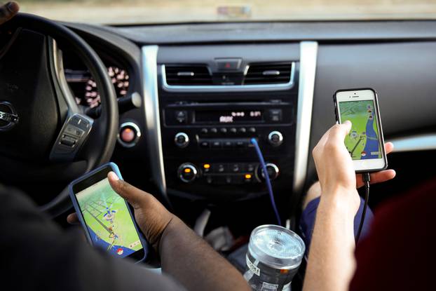 People play "Pokemon GO" in the small town of Occoquan