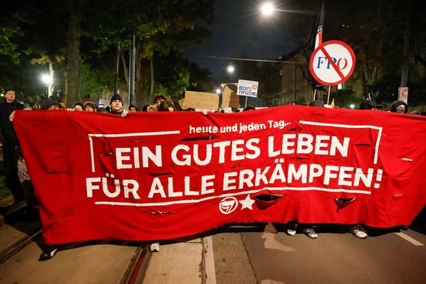 People attend a protest against Freedom Party after general elections in Vienna