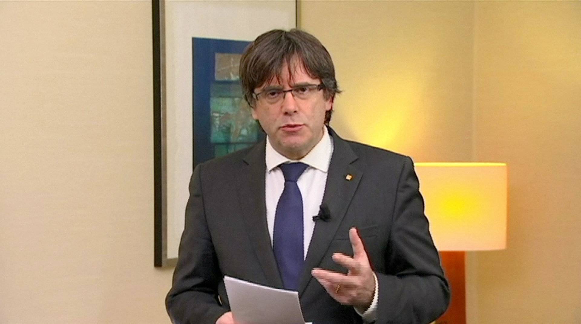Sacked Catalan President Carles Puigdemont makes a statement in Brussels