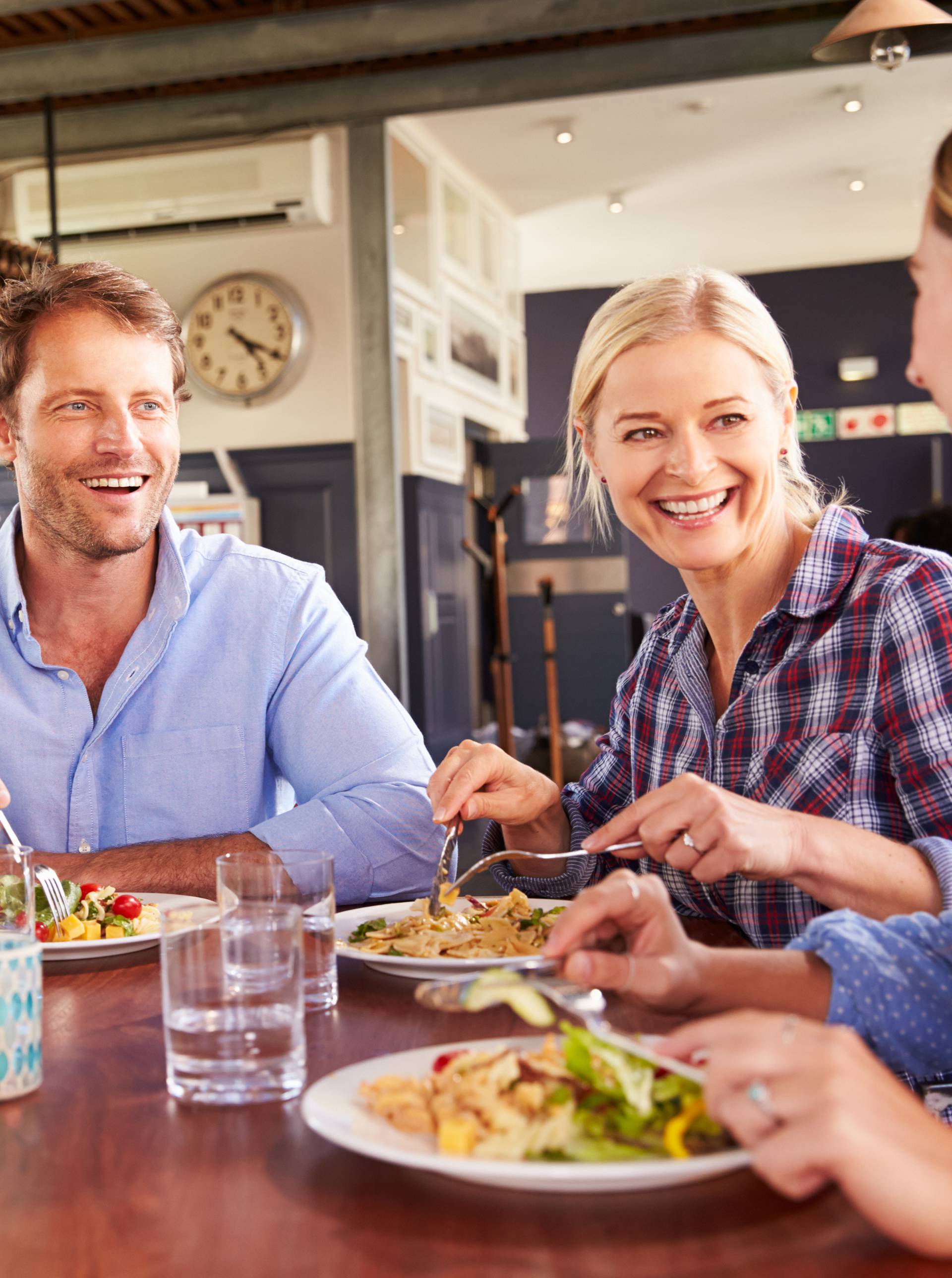 Group of friends eating at a restaurant