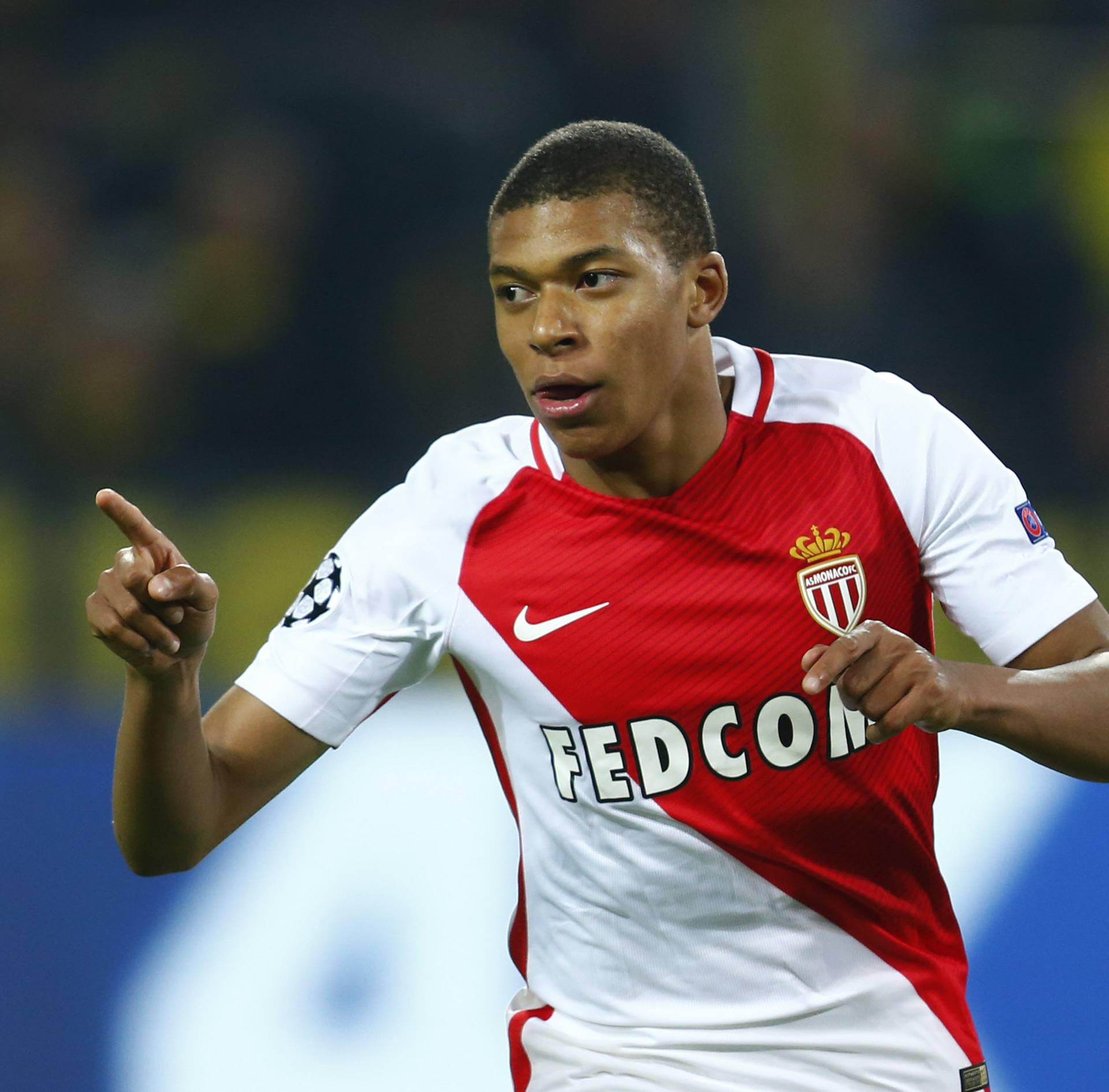 Monaco's Kylian Mbappe-Lottin celebrates scoring their third goal