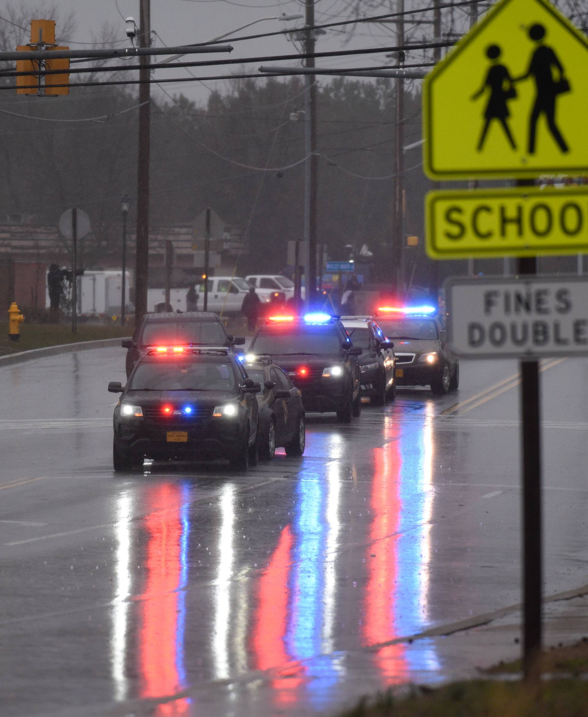 Law enforcement motorcade is seen near the Great Mills High School following a shooting on Tuesday morning in St. Mary's County, Maryland