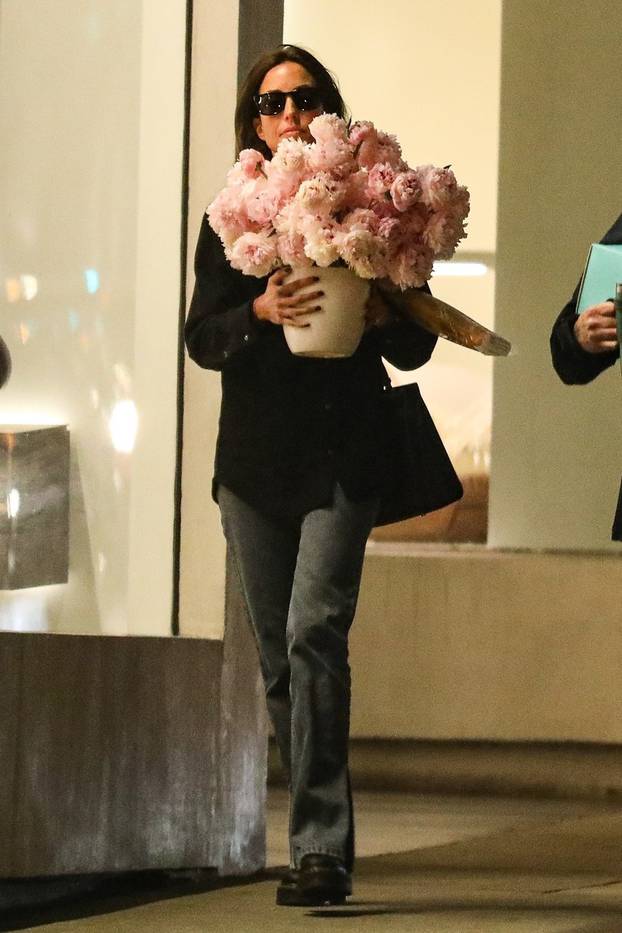*EXCLUSIVE* Love is in the air for Ines De Ramon who was seen leaving her office with a bouquet of flowers!