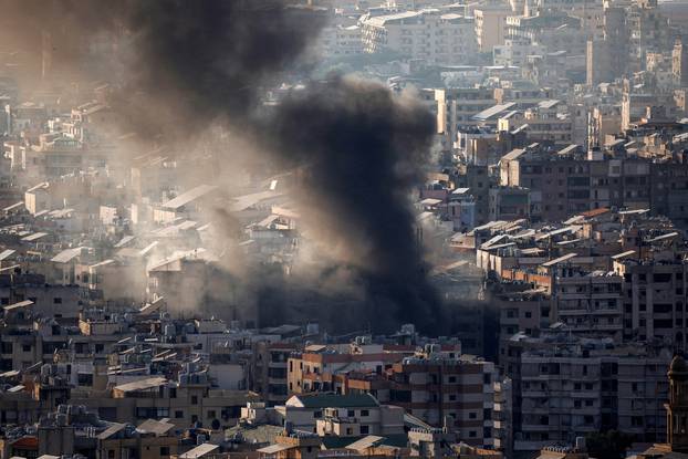 Smoke rises over Beirut’s suburbs