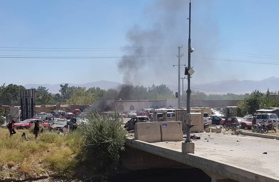 Smoke rises from the site of of a blast near an election rally held by President Ashraf Ghani in Parwan province, north of Kabul