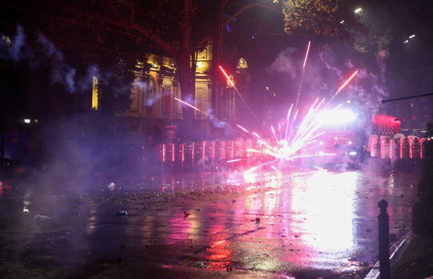 Supporters of Georgia's opposition attend a rally to protest, after government halts EU application until 2028, in Tbilisi