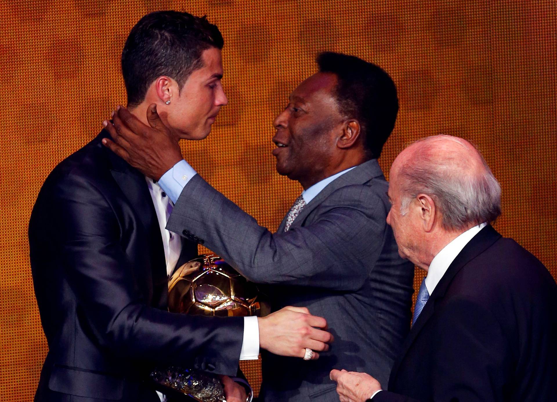 FILE PHOTO: Pele congratulates Portugal's Cristiano Ronaldo