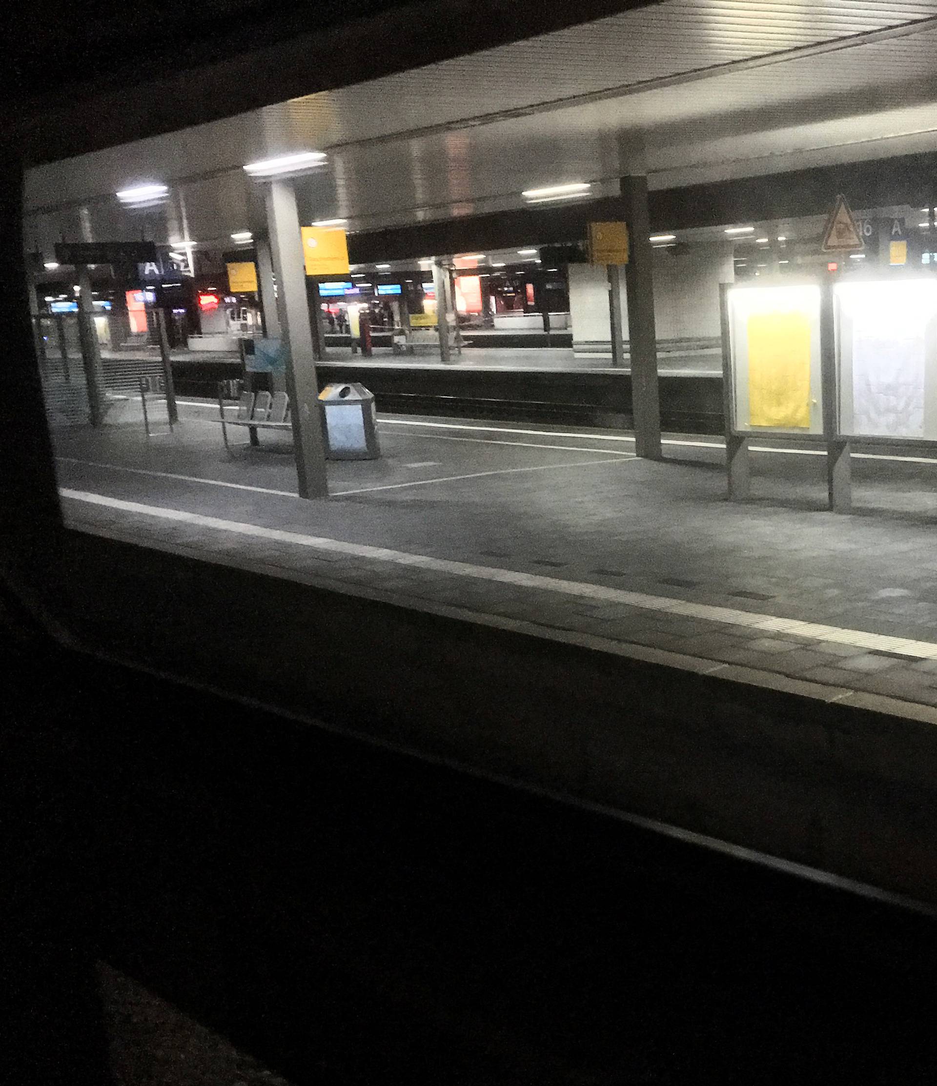 A picture taken out of a train shows empty platforms at Dusseldorf train station