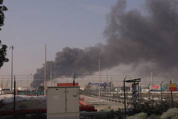Smoke appears after Iranian attack, following United States and Israel strikes on Iran, as seen from Dubai