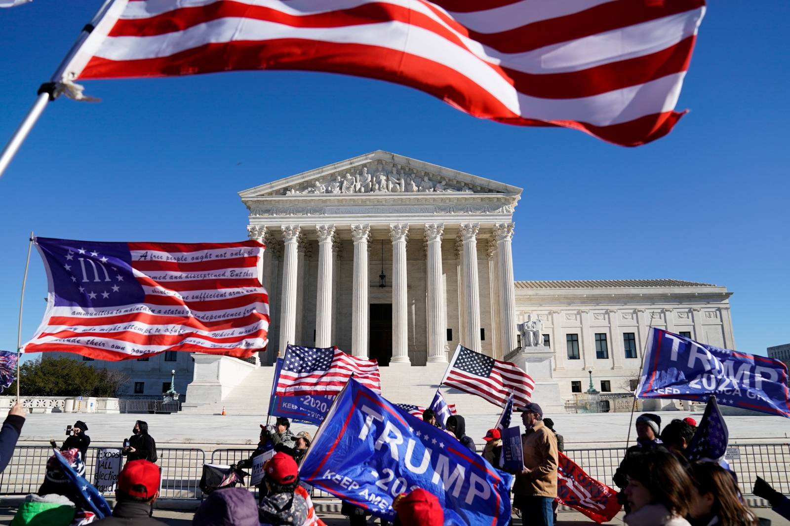 People participate in a "Stop the Steal" protest outside the U.S. Supreme Court in support of U.S. President Donald Trump in Washington