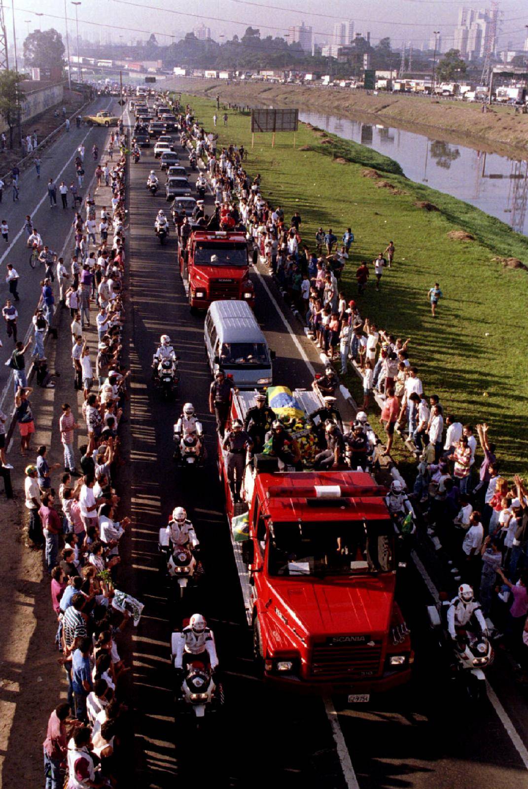 FILE PHOTO: A motorcade accompanying the coffin of Senna makes its way from Sao Paulo airport to the city center in Brazil