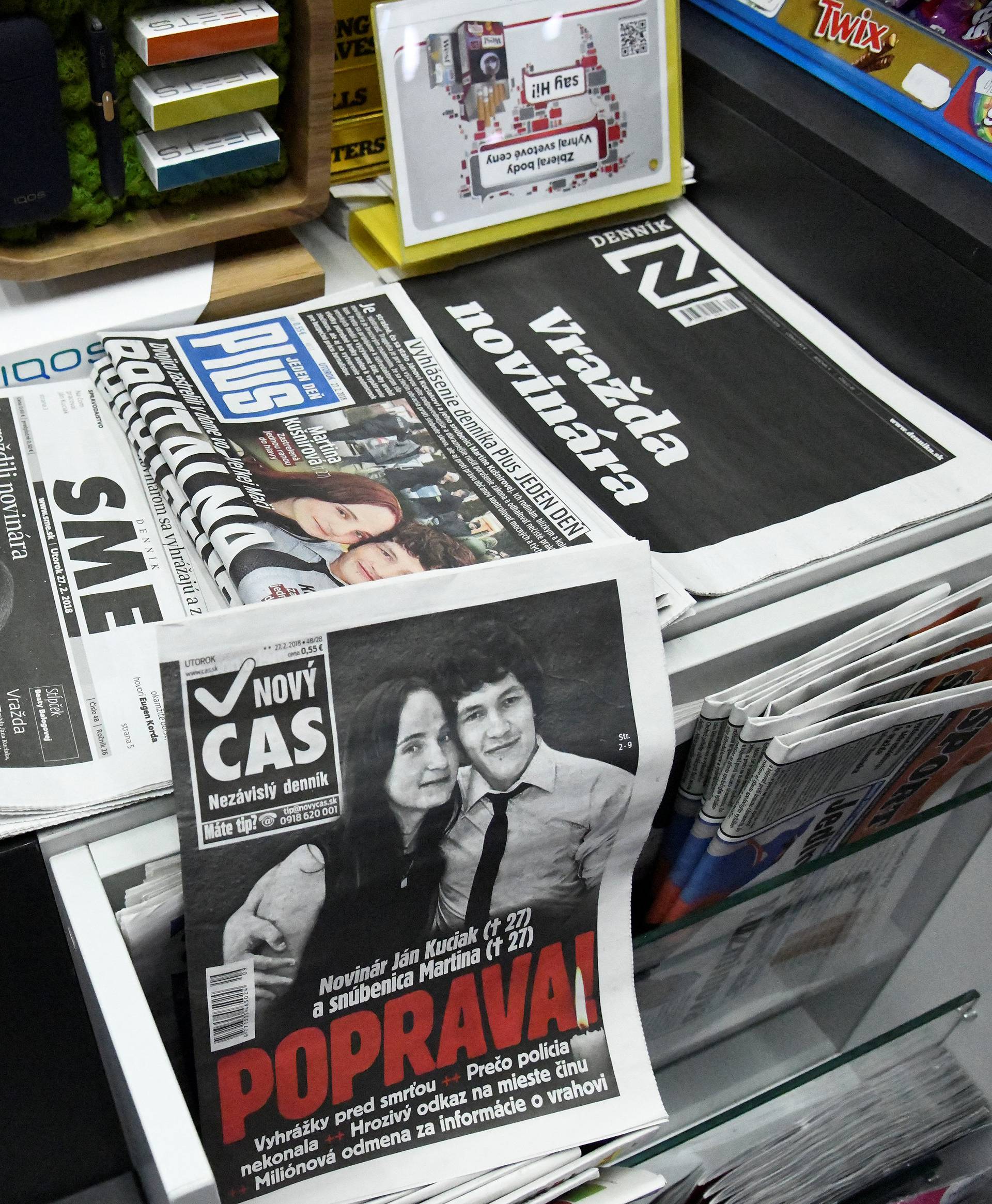 Front pages of Slovak newspapers are seen with headlines about and portraits of murdered Slovak investigative journalist Jan Kuciak and his girlfriend Martina Kusnirova, in a shop in Trnava