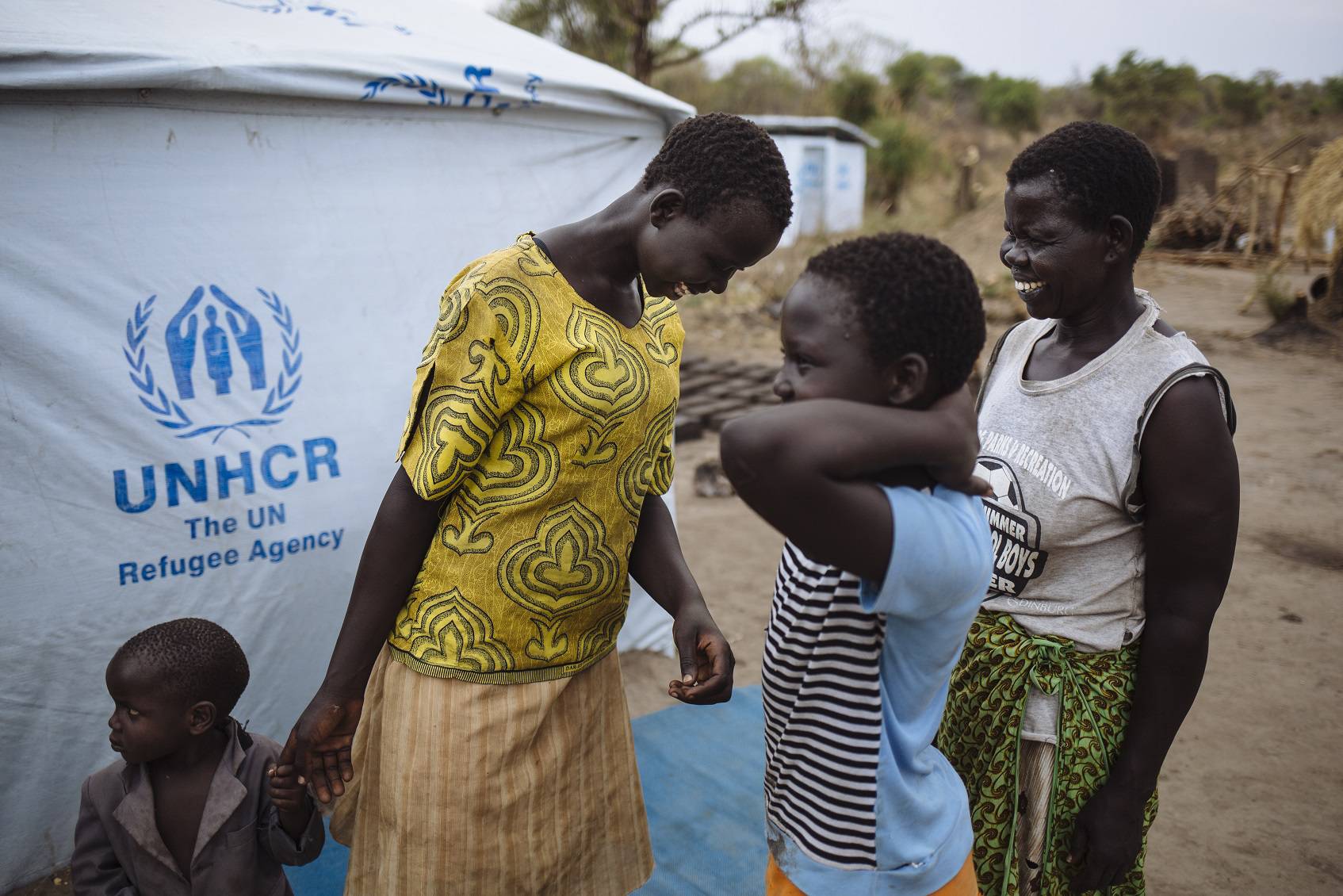 Uganda. South Sudanese refugee Joyce Kidi and her foster children at Bidibidi settlement