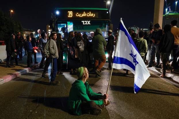Israelis protest a ceasefire deal, in Jerusalem