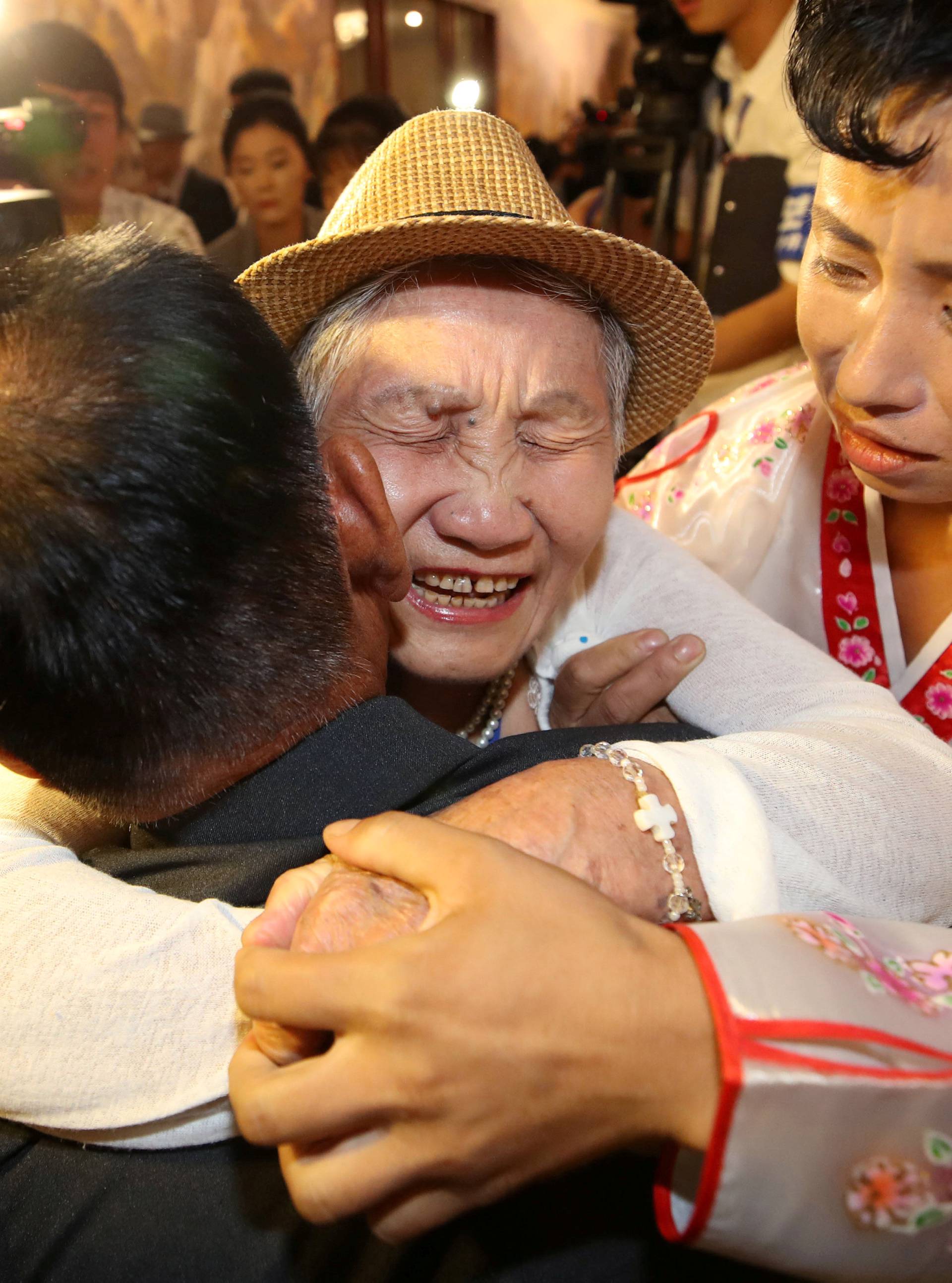 North and South Korean family members meet during a reunion at North Korea's Mount Kumgang resort