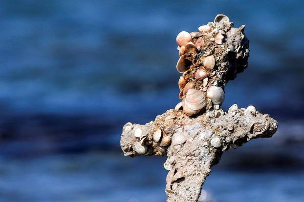 A sword believed to have belonged to a Crusader who sailed to the Holy Land almost a millennium ago was found in Caesarea