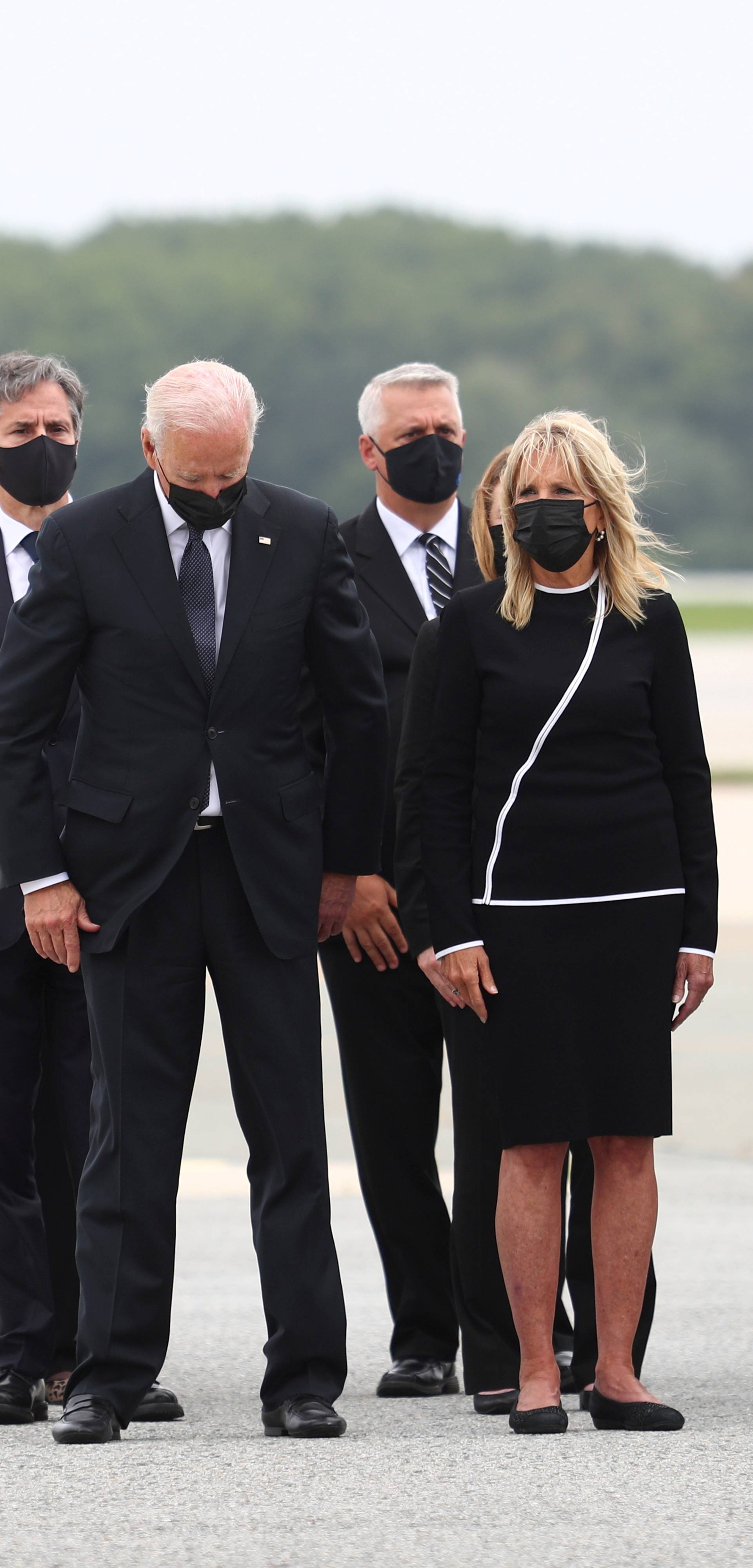 U.S. President Joe Biden attends the dignified transfer of the remains of U.S. Military service members who were killed by a suicide bombing at the Hamid Karzai International Airport
