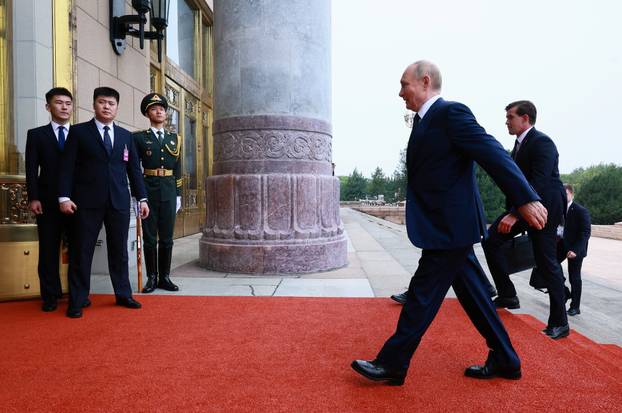 Russian President Vladimir Putin meets with Chinese President Xi Jinping and Mongolian President Ukhnaagiin Khurelsukh in Beijing