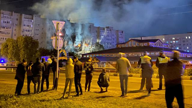 A view shows a site of a plane crash on residential building in the southern city of Yeysk