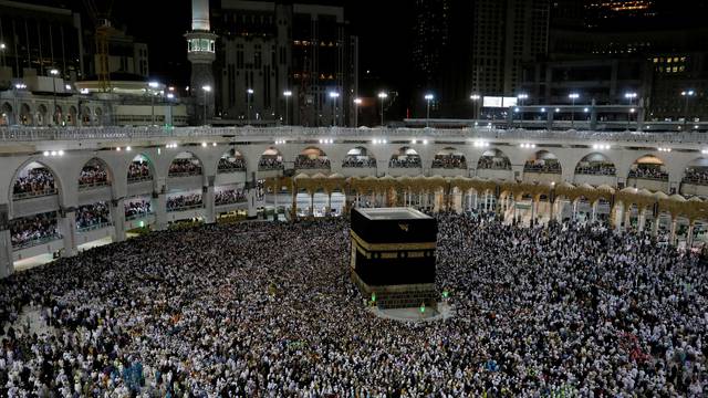 FILE PHOTO: Muslim pilgrims circle the Kaaba and pray at the Grand mosque at the end of their Haj pilgrimage in the holy city of Mecca