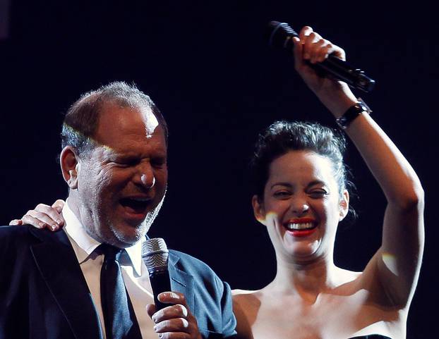 FILE PHOTO: Actress Cotillard and producer Weinstein lead an auction at the amfAR