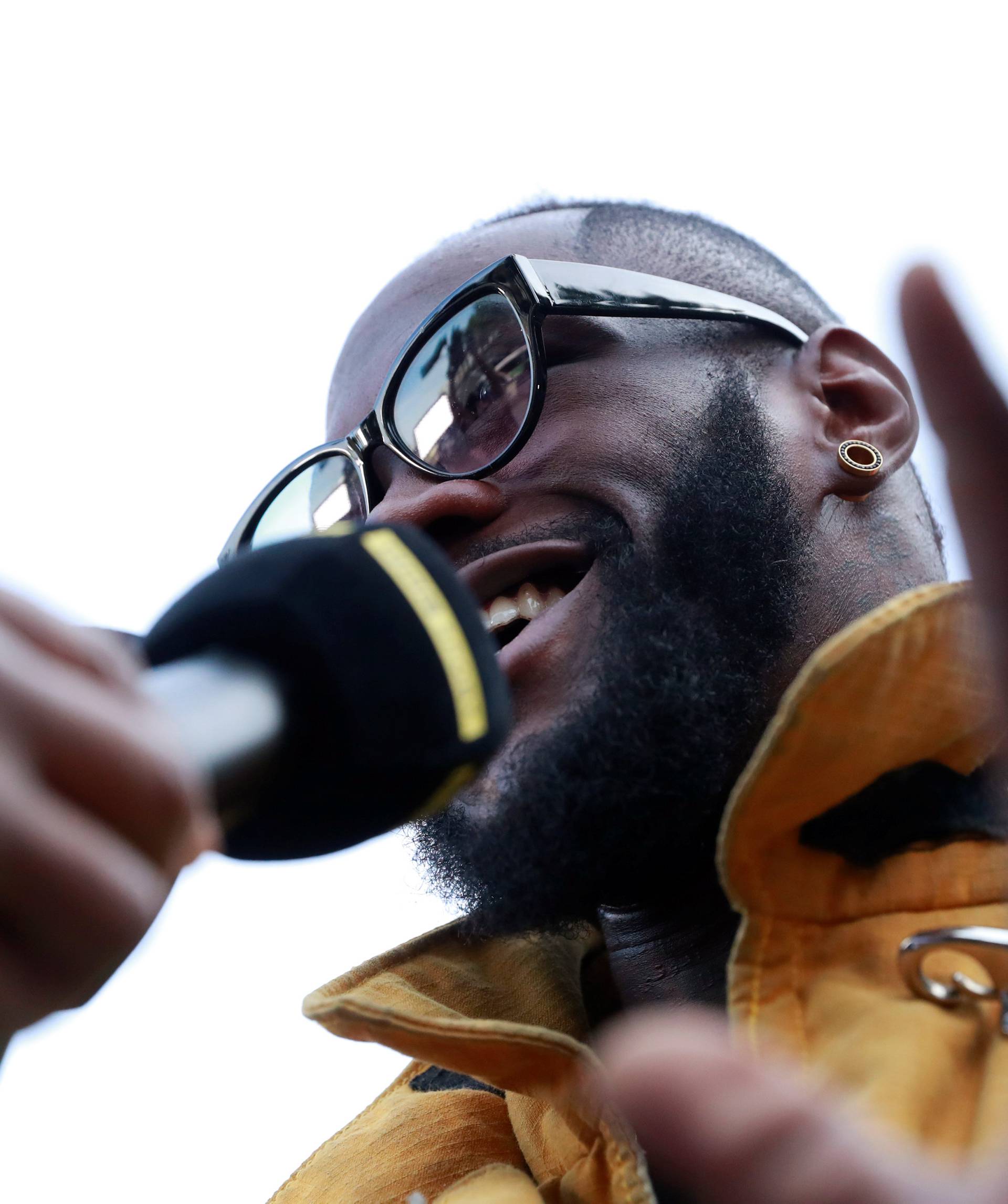 Deontay Wilder presents tickets to LA firefighters ahead of his WBC heavyweight title fight with Tyson Fury