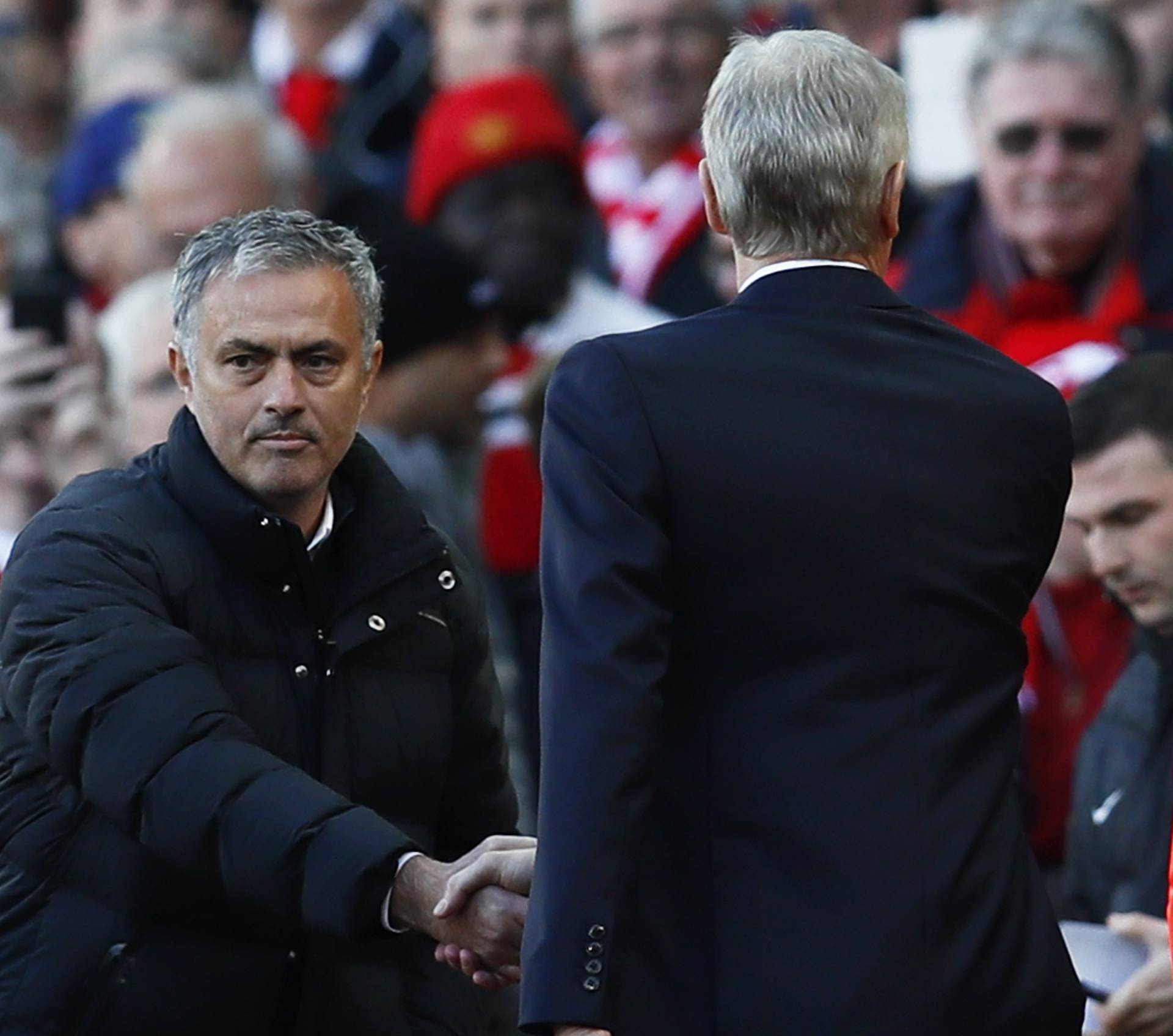 Manchester United manager Jose Mourinho and Arsenal manager Arsene Wenger shake hands before the match
