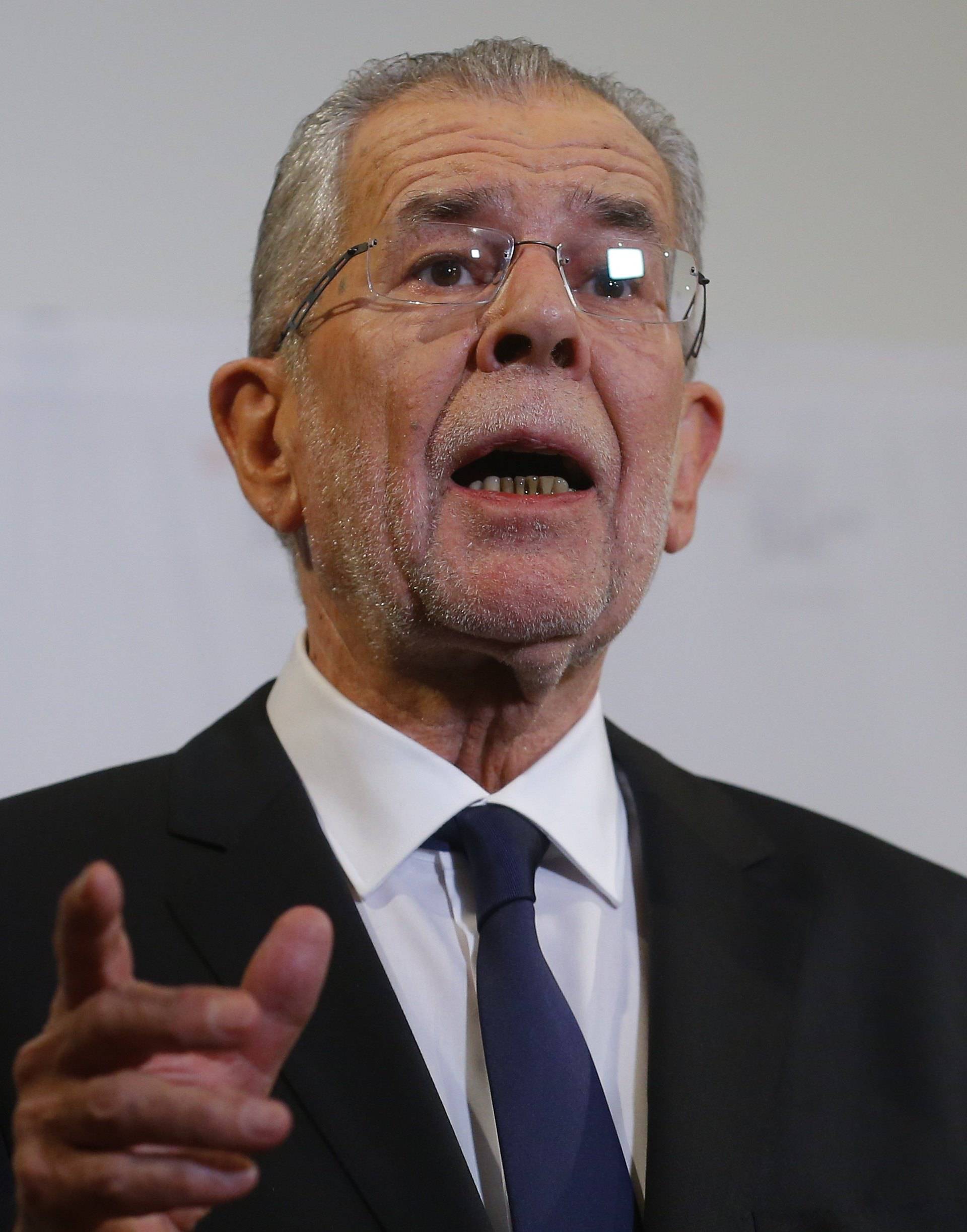 Austrian presidential candidate Van der Bellen, who is supported by the Greens, adresses the media during a press conference in Vienna