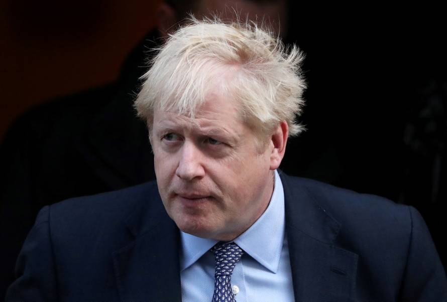 FILE PHOTO: Britain's Prime Minister Boris Johnson leaves Downing Street to head for the House of Commons as parliament discusses Brexit, sitting on a Saturday for the first time since the 1982 Falklands War, in London