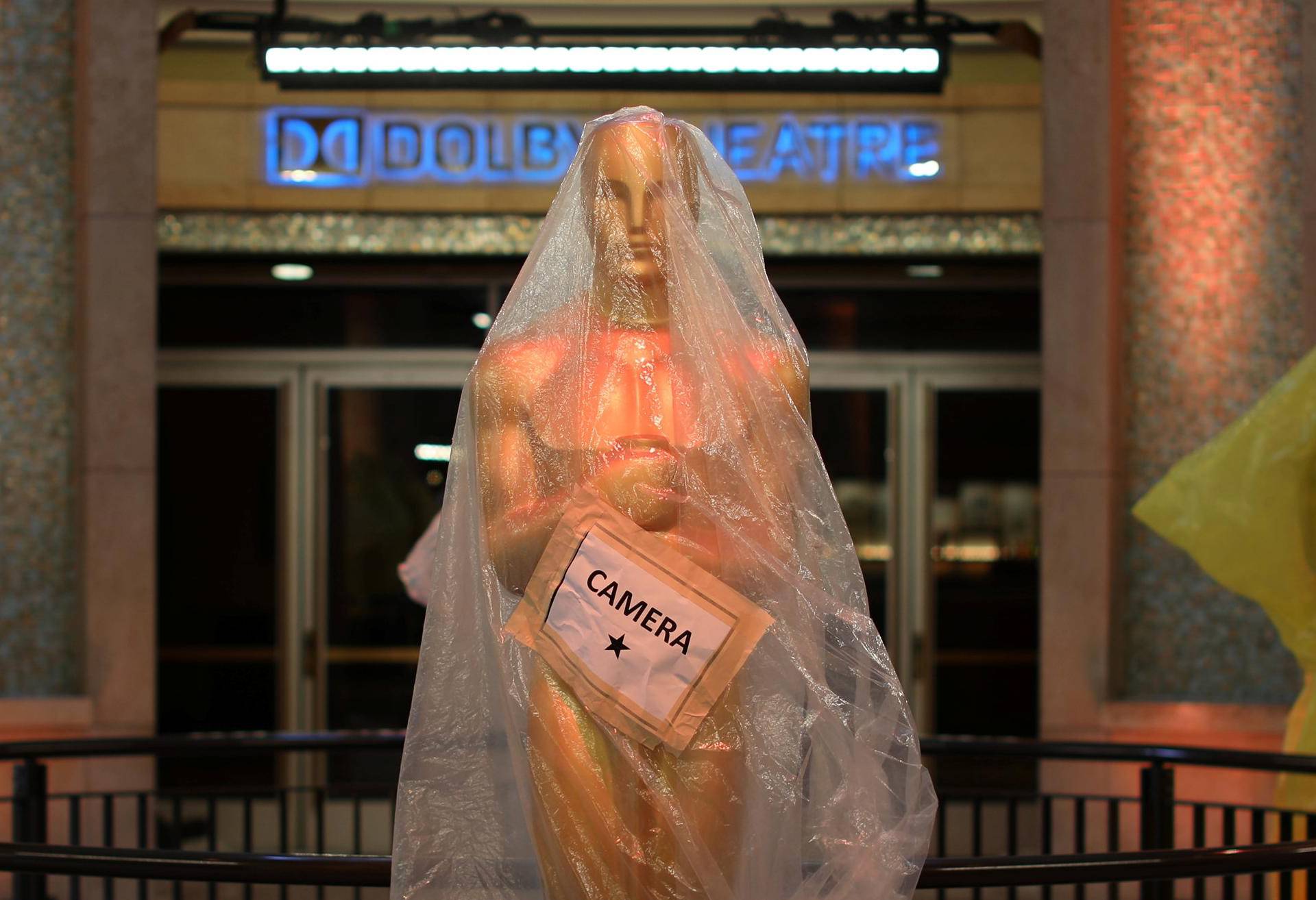Oscar statues sit covered in plastic at the entrance to the Dolby Theatre as preparations continue for the 89th Academy Awards in Hollywood,