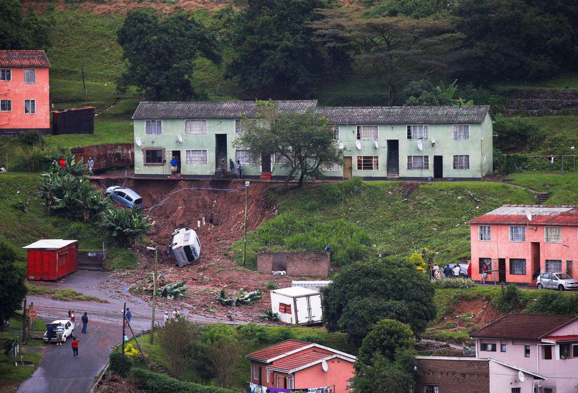 Clean up operations begin after heavy rains caused flood damage in Marianridge, Durban