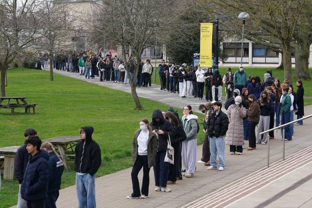 Students queuing for antibiotics outside a building at the University of Kent in Canterbury. The university have confirmed that a student was one of two people who have died as a result of meningitis in the area. The UK Health Security Agency (UKHSA) said