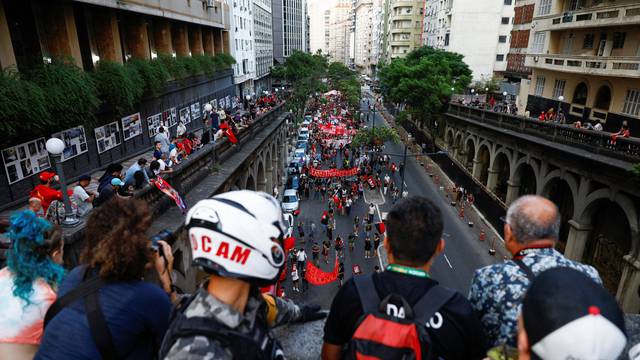 Pro-democracy demonstrators march in Porto Alegre