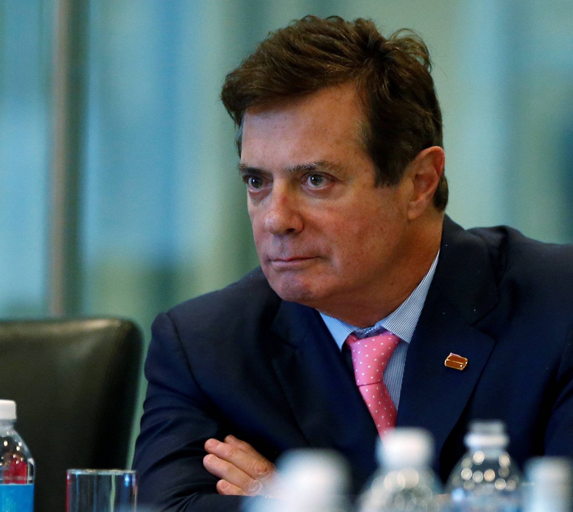 FILE PHOTO: Manafort of Republican presidential nominee Trump's staff listens during a round table discussion on security at Trump Tower in the Manhattan borough of New York