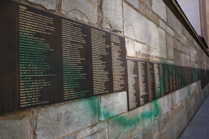 The Wall of the Righteous covered in green paint, in Paris