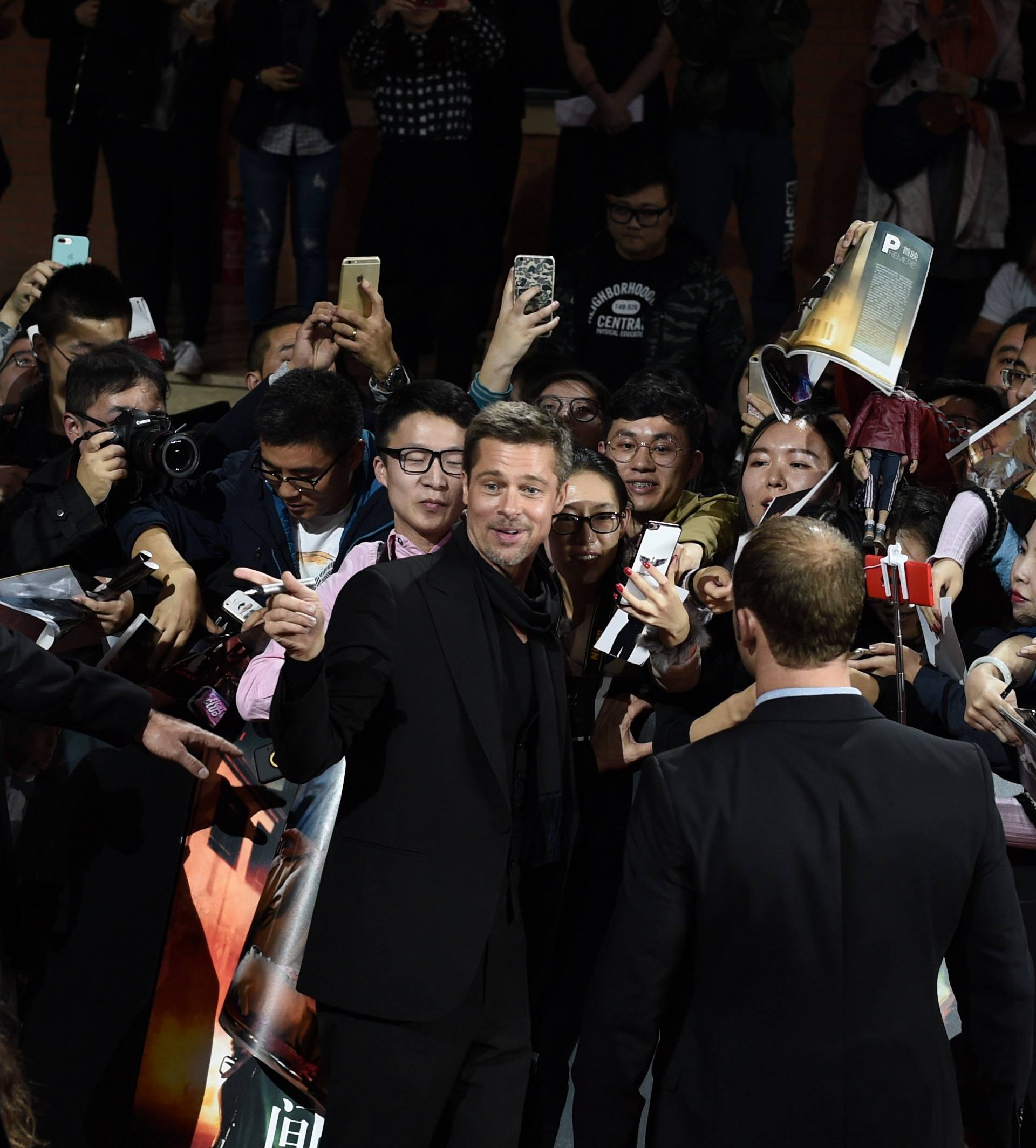 Actor Brad Pitt attends a promotional event for the movie "Allied" in Shanghai