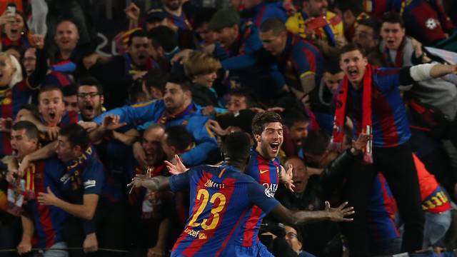 Barcelona's Sergi Roberto celebrates scoring their sixth goal with Samuel Umtiti