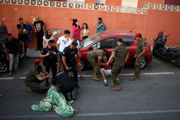 Mass crossings of migrants on foot and by sea from Morocco into Spanish territory, in Ceuta