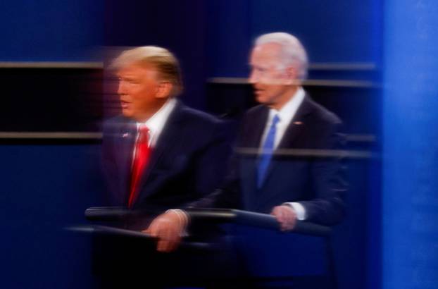 FILE PHOTO: President Trump and Democratic presidential nominee Biden participate in their second debate in Nashville