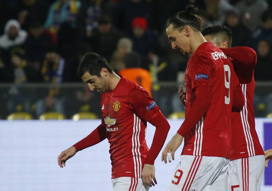 Manchester United's Henrikh Mkhitaryan celebrates scoring their first goal with team mates