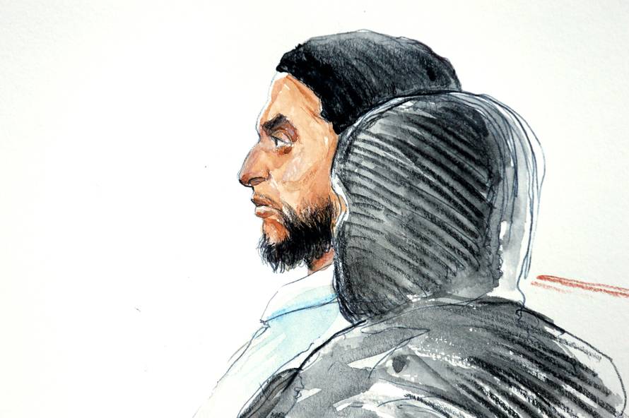 A court artist drawing shows Salah Abdeslam, one of the suspects in the 2015 Islamic State attacks in Paris, in court during his trial in Brussels