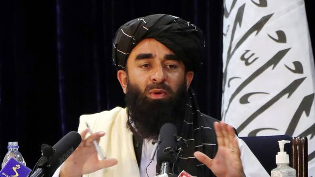 FILE PHOTO: Taliban spokesman Zabihullah Mujahid speaks during a news conference in Kabul