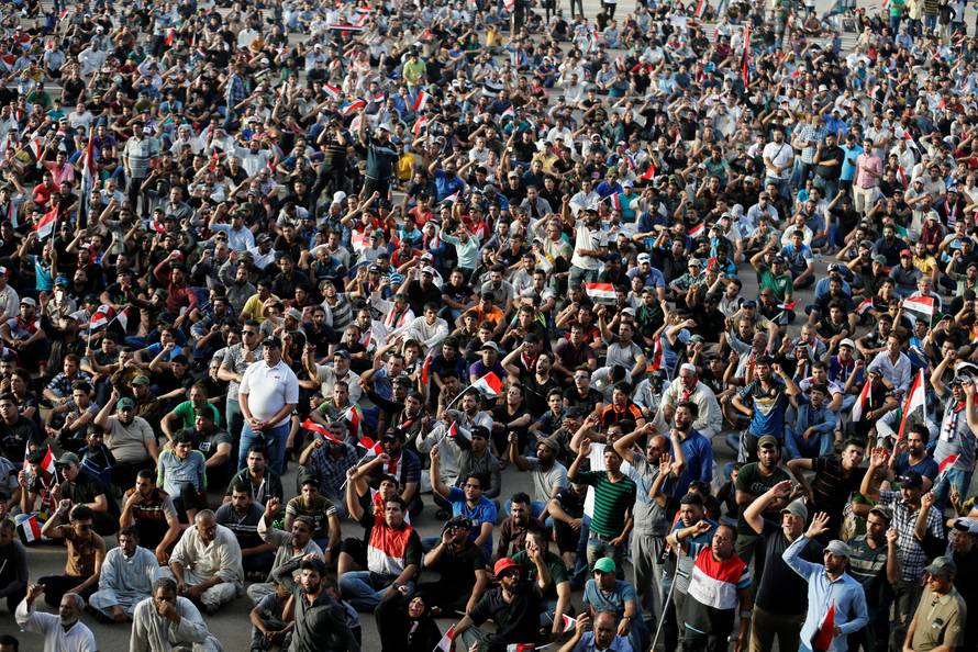 Followers of Iraqi Shi'ite cleric Moqtada al-Sadr gather at Grand Festivities Square within the Green Zone in Baghdad